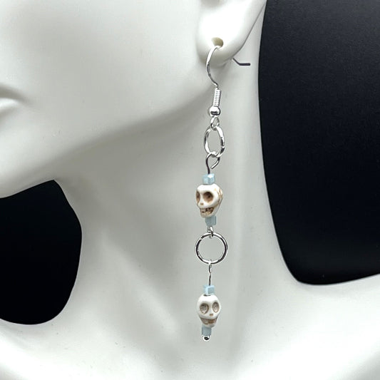 Silver Tone Skull Dangle Earrings with Blue Glass Square Beads