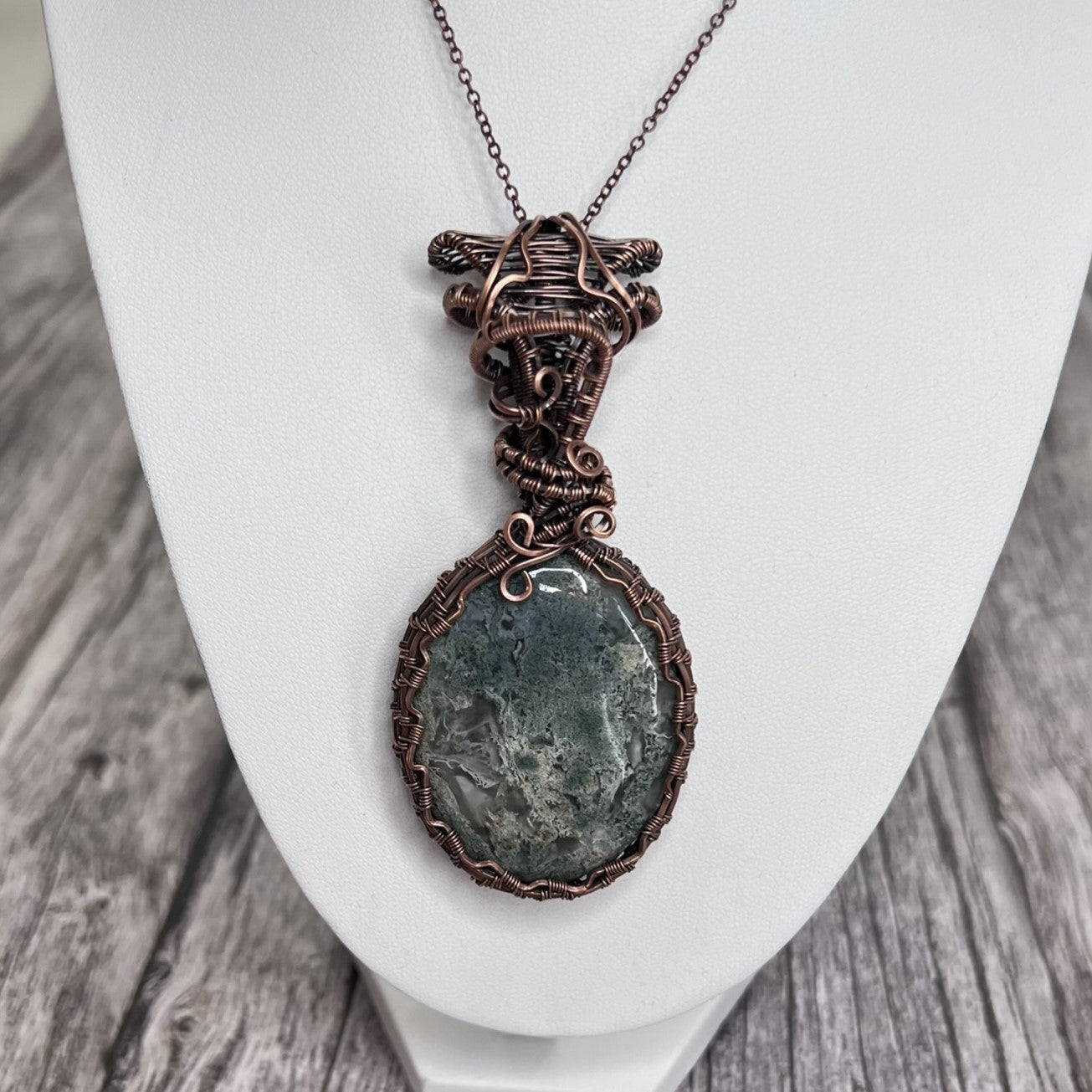 Moss Agate Oval Worry Stone Wrapped in Woven Copper with Tripe Bale Detail