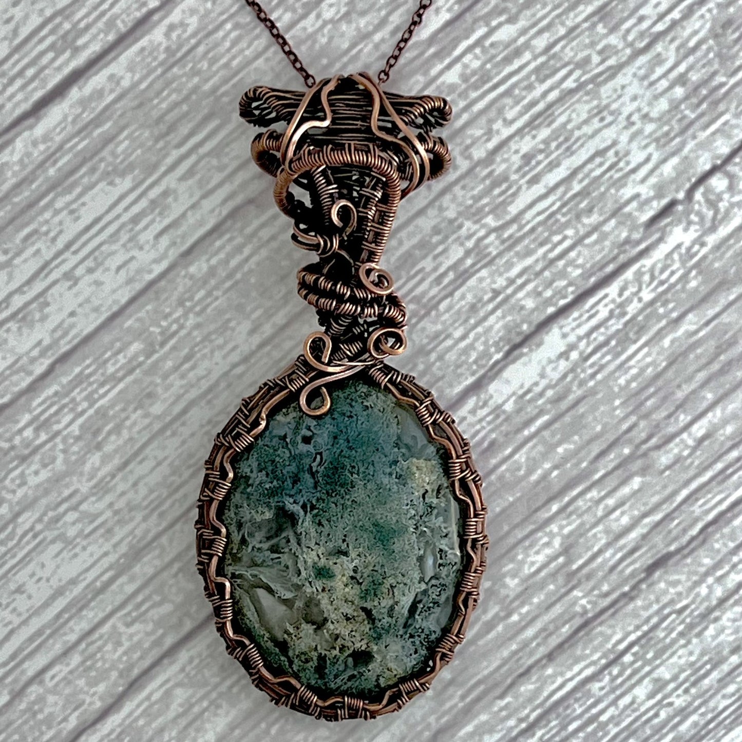 Moss Agate Oval Worry Stone Wrapped in Woven Copper with Tripe Bale Detail