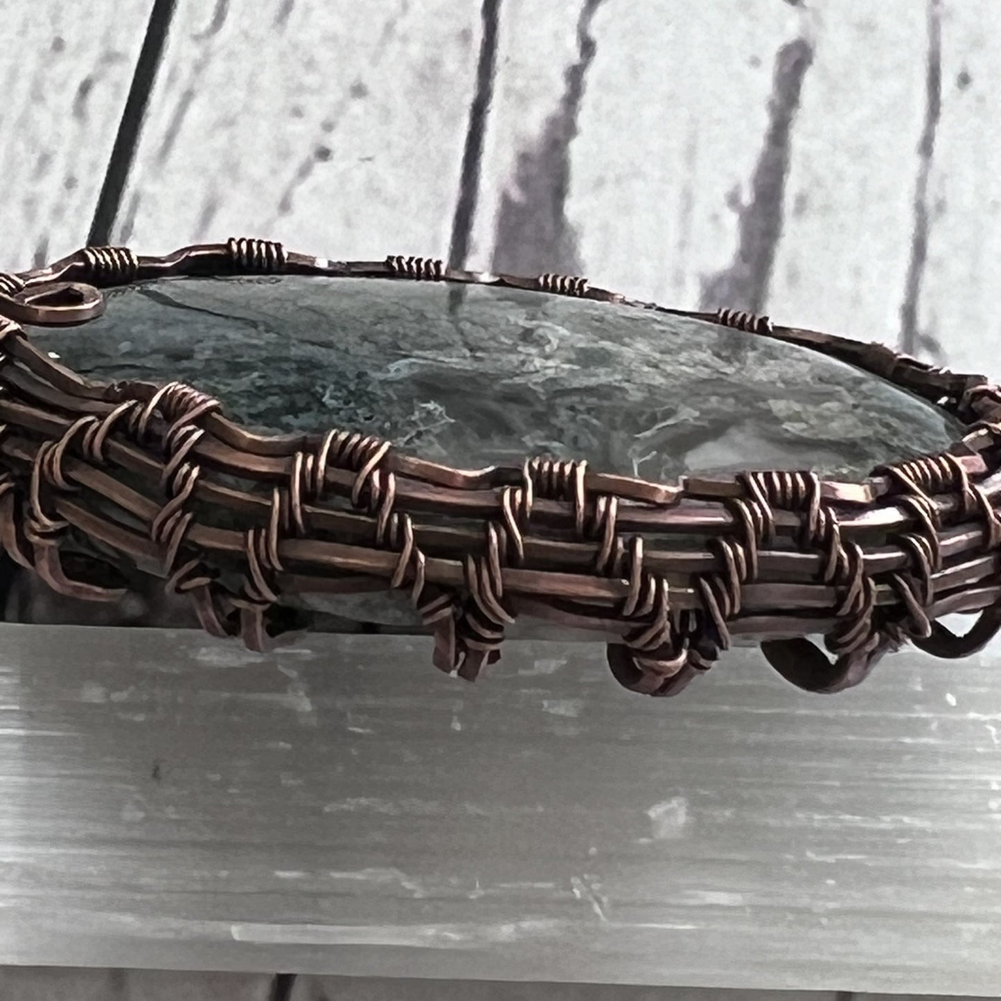 Moss Agate Oval Worry Stone Wrapped in Woven Copper with Tripe Bale Detail