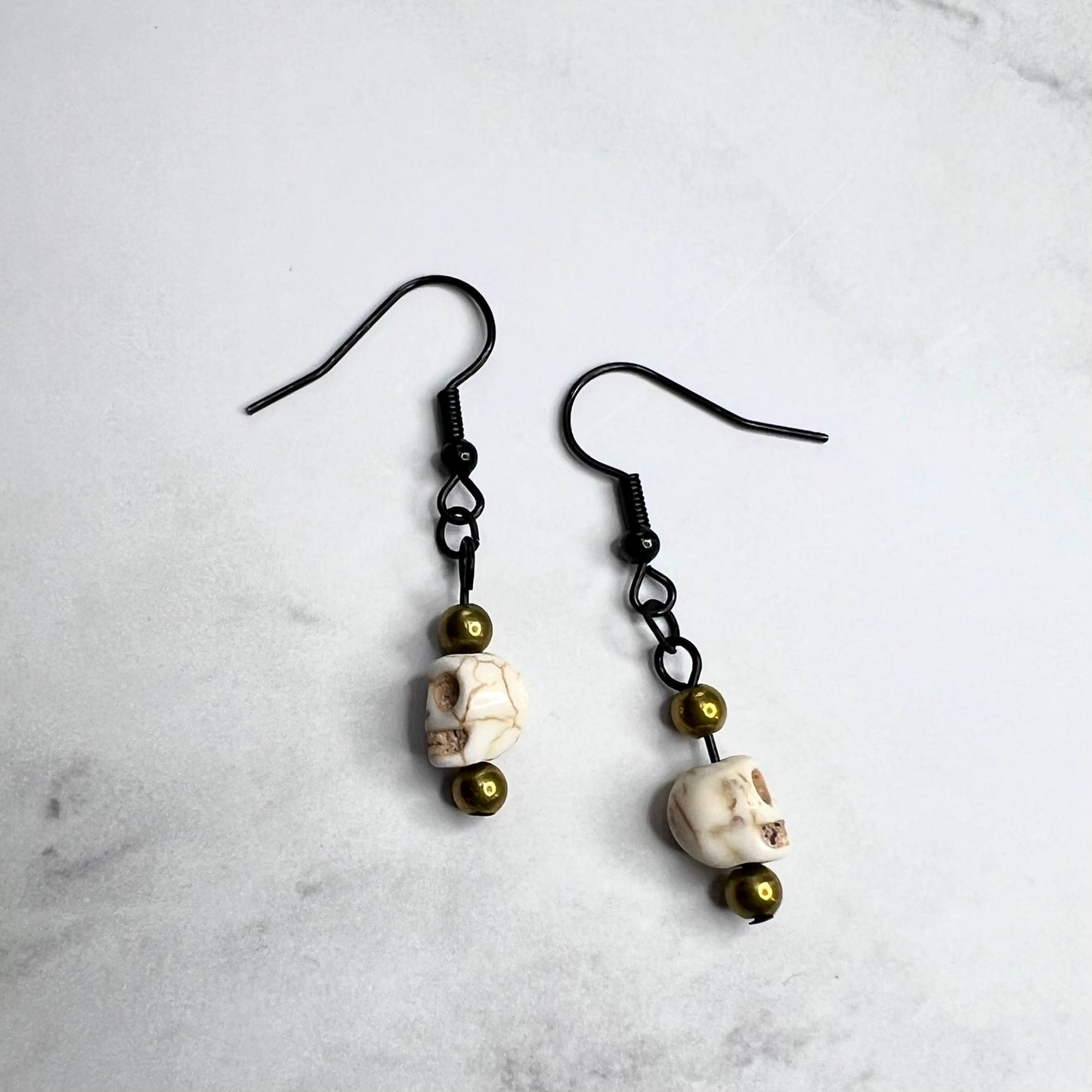 Howlite Skull Earrings with Gold Accent